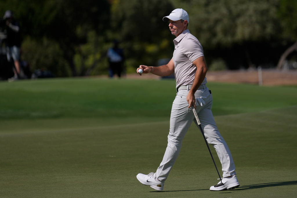Rory McIlroy of Northern Ireland reacts after a birdie on the 1st hole during the third round of World Tour Golf Championship at Jumeirah Golf Estates, in Dubai, United Arab Emirates, Saturday, Nov. 15, 2025. (AP Photo/Altaf Qadri)