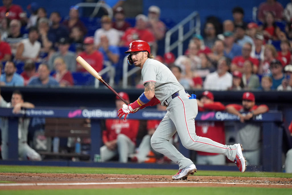 Philadelphia Phillies' Bryson Stott runs after hitting a two-run double during the third inning of a baseball game against the Miami Marlins, Wednesday, July 29, 2026, in Miami. (AP Photo/Rebecca Blackwell).