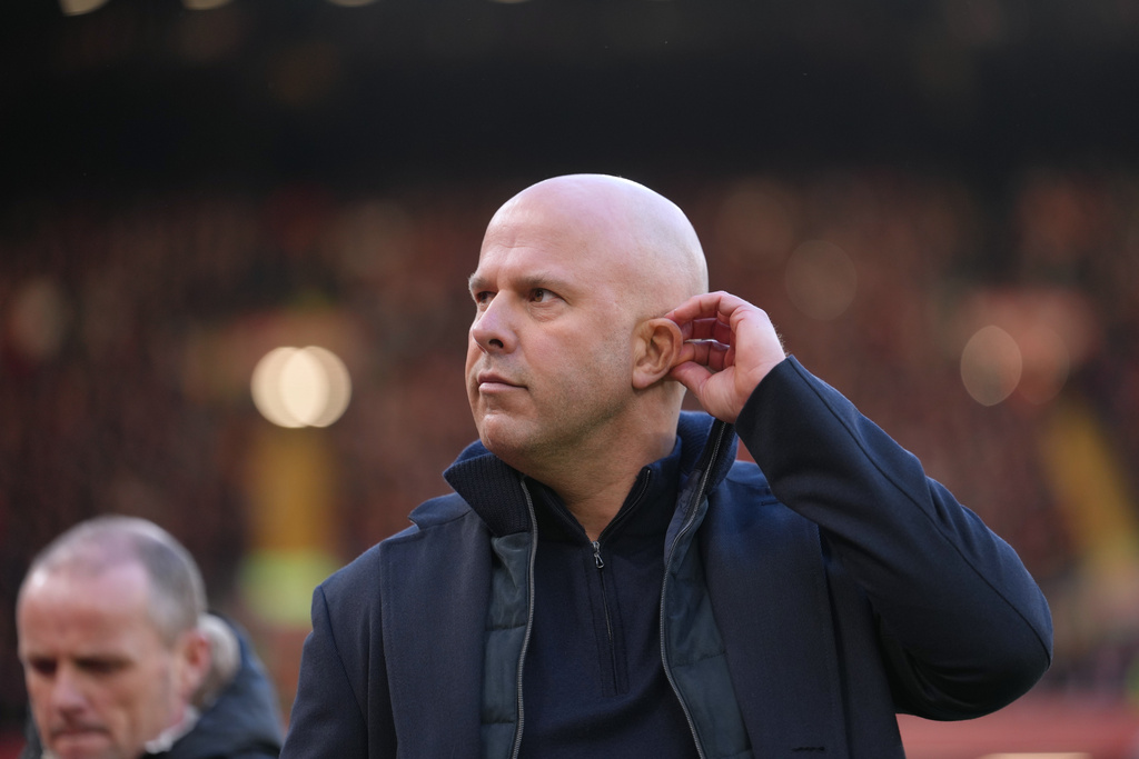 Liverpool's manager Arne Slot enters to the pitch prior to the English Premier League soccer match between Liverpool and Burnley in Liverpool, England, Saturday, Jan. 17, 2026. (AP Photo/Jon Super)