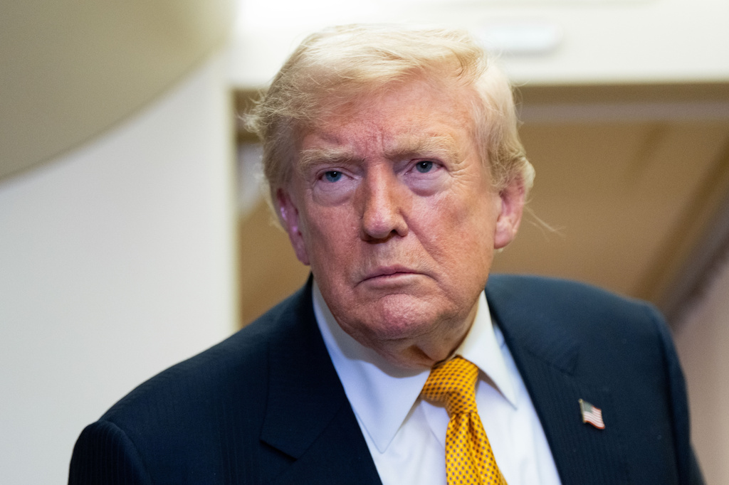 President Donald Trump speaks with reporters in flight on Air Force One after landing at U.S. Air Force Base at RAF Mildenhall, in Suffolk Eastern England, Wednesday, July 8, 2026. (AP Photo/Alex Brandon)