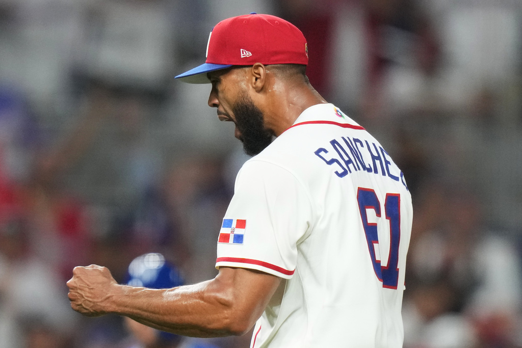 Dominican Republic pitcher Cristopher Sánchez retracts after striking out Nicaragua's Melvin Novoa to end the inning during the first inning of a World Baseball Classic game against Nicaragua, Friday, March 6, 2026, in Miami. (AP Photo/Lynne Sladky)
