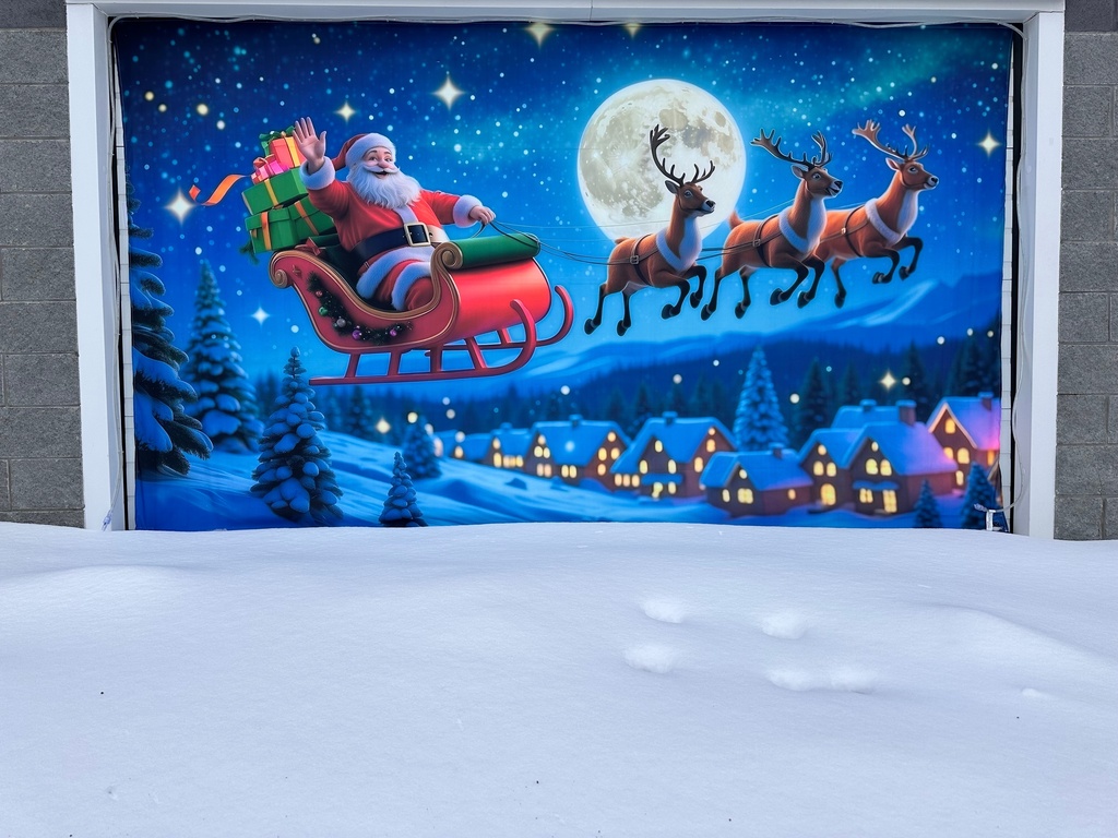 A Christmas mural overlooks fresh snow in Lowville, N.Y., on Saturday, Dec. 27, 2025. (AP Photo/Cara Anna)