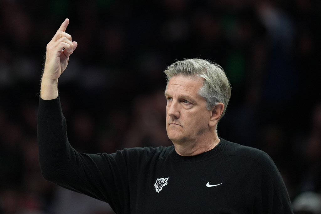 Minnesota Timberwolves head coach Chris Finch calls for the review of a play during the first half of Game 4 of an NBA basketball second-round playoffs series against the San Antonio Spurs in Minneapolis, Sunday, May 10, 2026. (AP Photo/Abbie Parr)