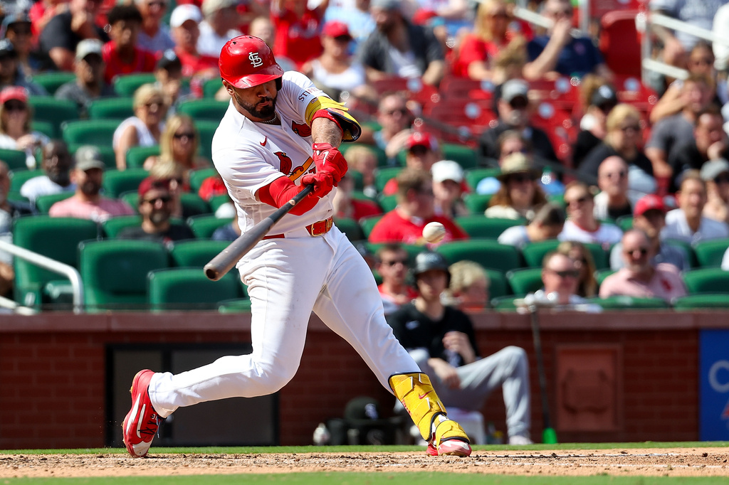 St. Louis Cardinals' Iván Herrera hits a single during the sixth inning of a baseball game against the Chicago White Sox Sunday, Sept. 13, 2026, in St. Louis. (AP Photo/Scott Kane)