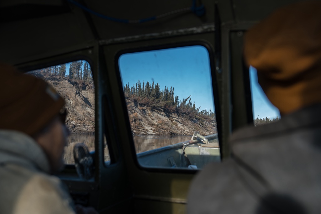 Tristen Pattee hunts with his family along the Kobuk River near Ambler, Alaska, where heavy rains have contributed to riverbank erosion Tuesday, Sept. 30, 2025. (AP Photo/Annika Hammerschlag)