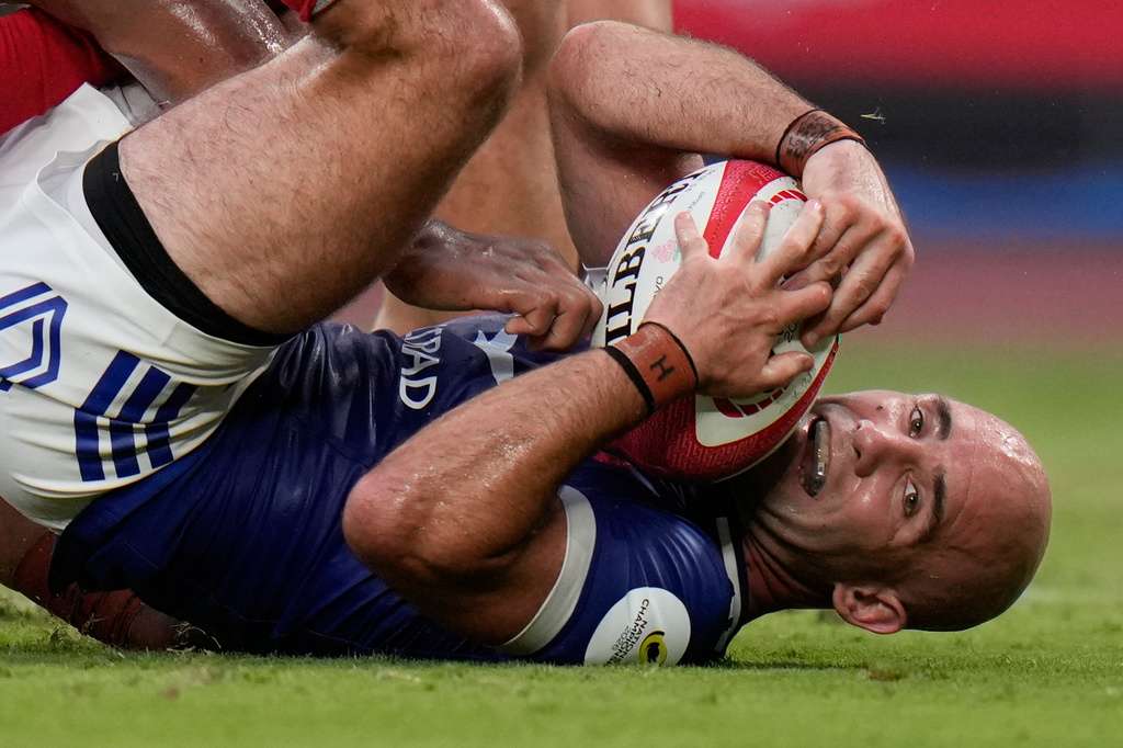 France's Maxime Lucu scores a try during a Nations Championship rugby match between Japan and France in Tokyo, Saturday, July 18, 2026. (AP Photo/Shuji Kajiyama)