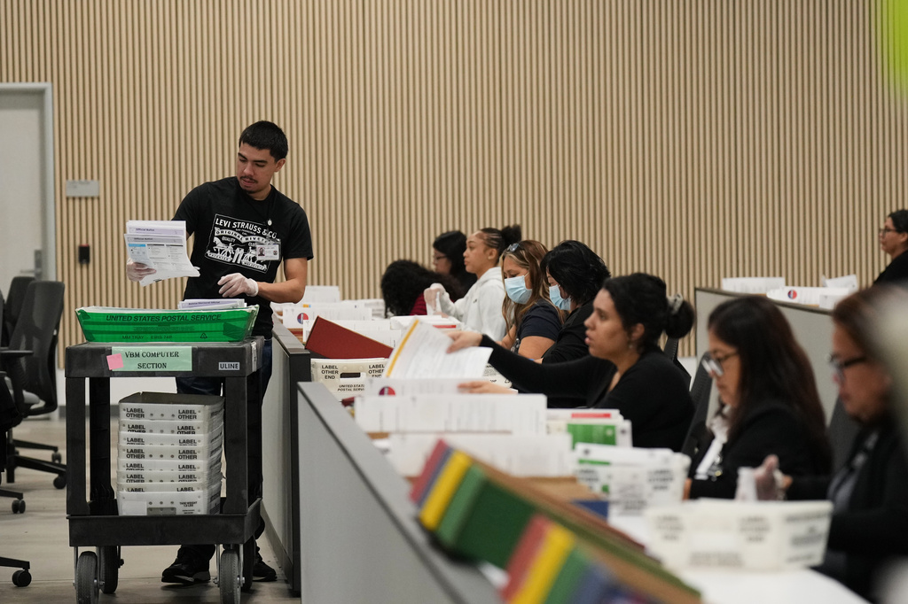 Ballots are inspected the day after California's primary election at the LA County Ballot Processing Center Wednesday, June 3, 2026, in City of Industry, Calif. (AP Photo/Jae C. Hong)