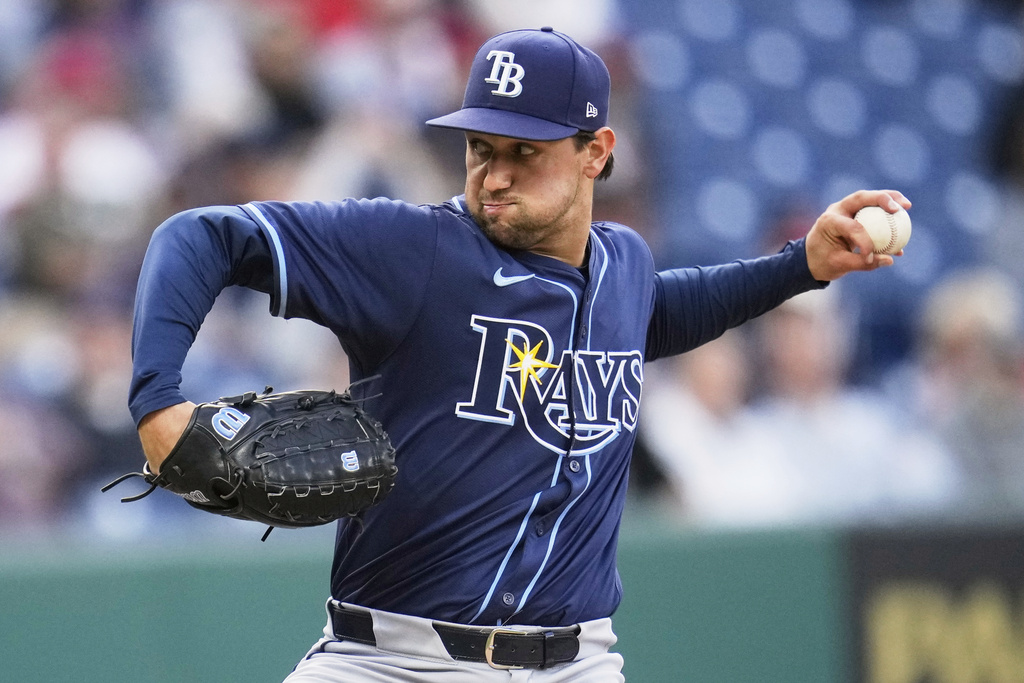 Tampa Bay Rays' Ian Seymour pitches in the first inning of a baseball game against the Cleveland Guardians in Cleveland, Monday, Aug. 25, 2025. (AP Photo/Sue Ogrocki)