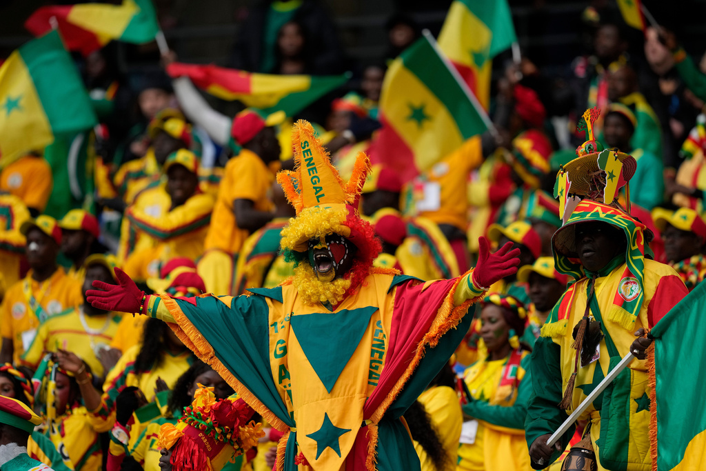 Senegal fans cheer during the Africa Cup of Nations group D soccer match between Senegal and DR Congo in Tangier, Morocco, Saturday, Dec. 27, 2025. (AP Photo/Themba Hadebe)