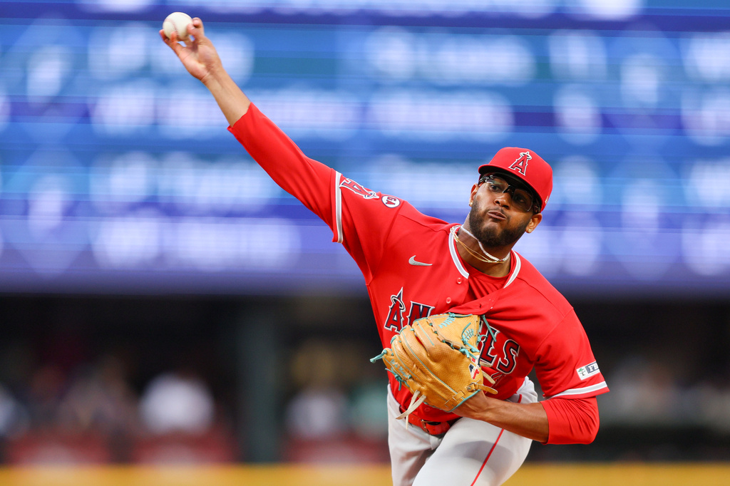 Los Angeles Angels pitcher Walbert Ureña delivers in the third inning of a baseball game against the Los Angeles Angels, Thursday, July 2, 2026, in Seattle. (AP Photo/Kevin Ng)