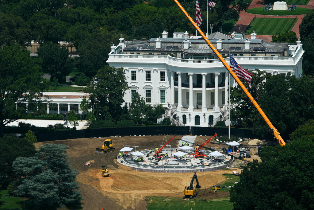 Construction continues on a helipad on the South Lawn of the White House, Monday, Aug. 17, 2026, in Washington. (AP Photo/Julia Demaree Nikhinson)
