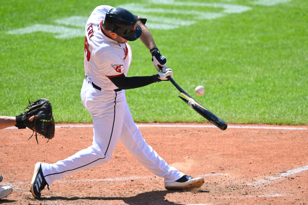 Cleveland Guardians' David Fry breaks his bat on a swing while hitting a flyout during the seventh inning of a baseball game against the Seattle Mariners, Sunday, June 28, 2026, in Cleveland. (AP Photo/David Richard)