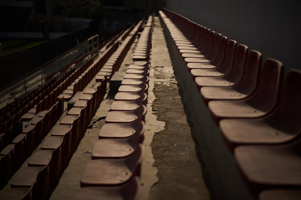 Empty seats line the grandstands at Faisal al-Husseini Stadium in the West Bank town of Al-Ram, Monday, May 11, 2026. (AP Photo/Leo Correa)