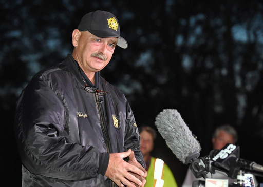 FILE - Spartanburg County Sheriff Chuck Wright speaks during a news conference in front of Todd Kohlhepp's property in Woodruff, S.C., Nov. 6, 2016. (AP Photo/Richard Shiro, File) FILE - Spartanburg County Sheriff Chuck Wright speaks during a news conference in front of Todd Kohlhepp's property in Woodruff, S.C., Nov. 6, 2016. (AP Photo/Richard Shiro, File)