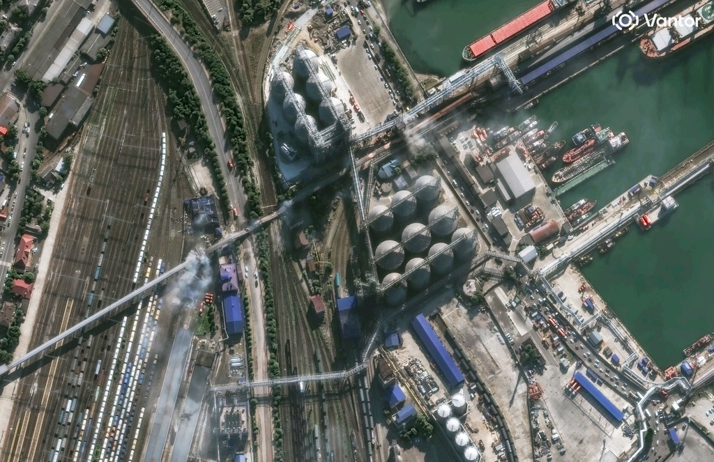This image provided by Vantor shows smoke in an overview of port infrastructure in Novorossiysk, Russia, Wednesday, Aug. 12, 2026. (Satellite image ©2026 Vantor via AP)