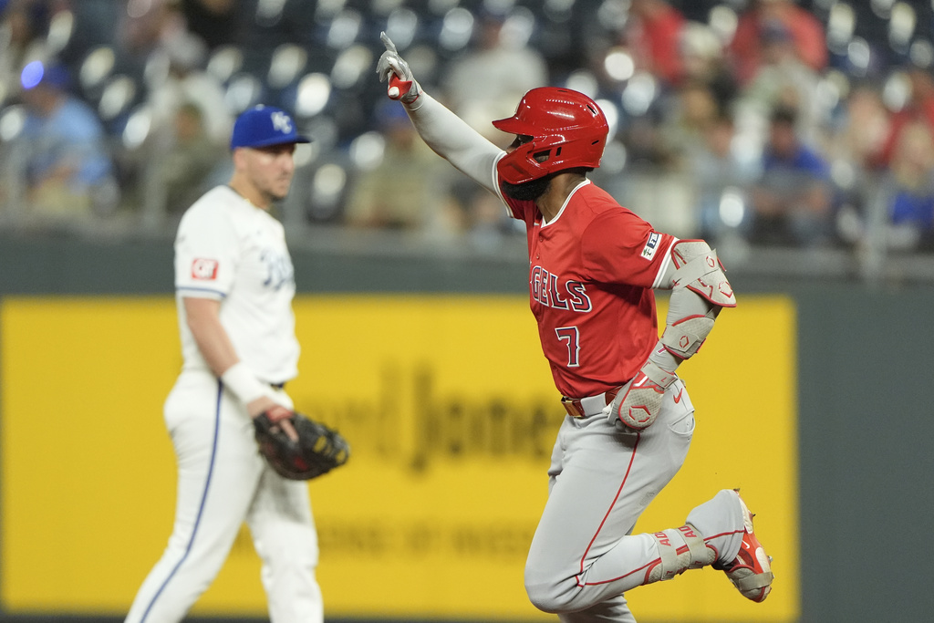 Los Angeles Angels' Jo Adell (7) runs the bases after hitting a solo home run during the sixth inning of a baseball game Tuesday, Sept. 2, 2025, in Kansas City, Mo. (AP Photo/Charlie Riedel)