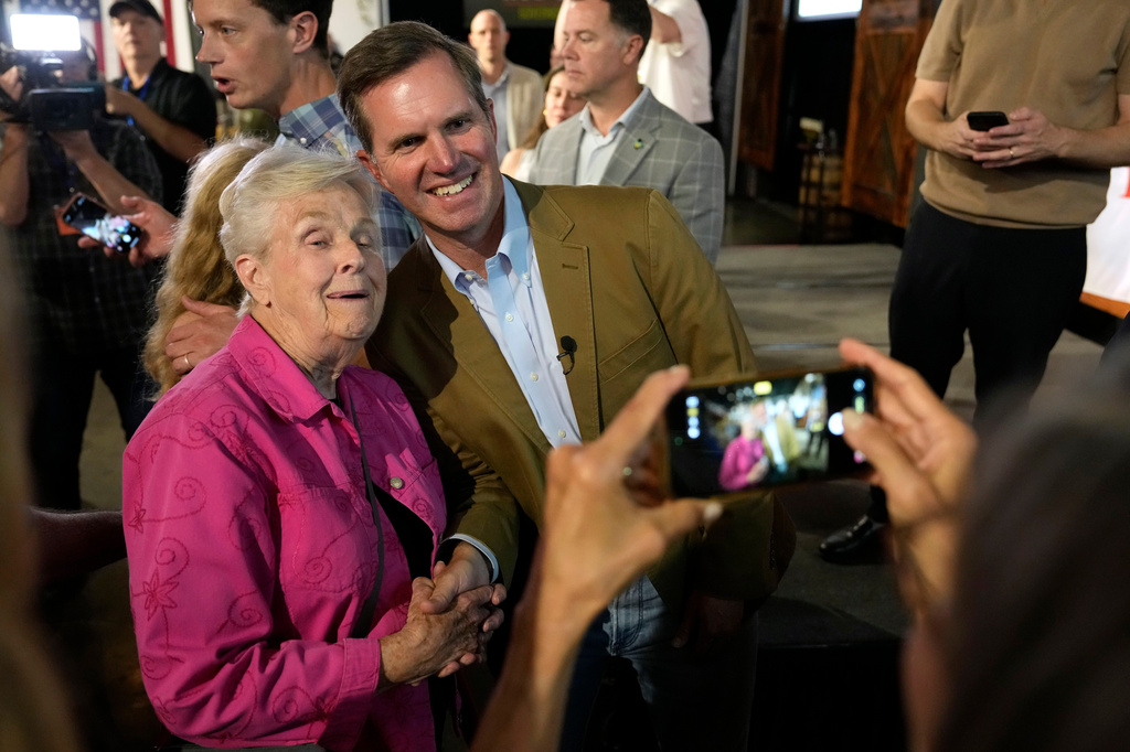 Kentucky Gov. Andy Beshear poses for a photos during a campaign rally for Iowa Democratic gubernatorial candidate Rob Sand, Sunday, June 7, 2026, in Des Moines, Iowa. (AP Photo/Charlie Neibergall)