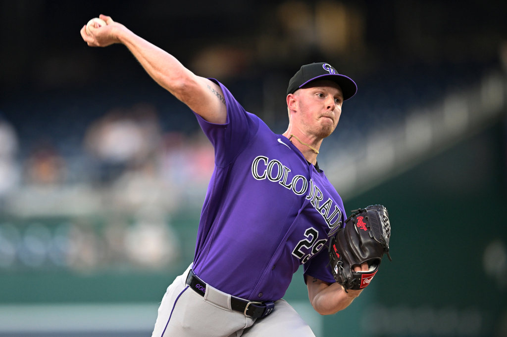 Colorado Rockies starting pitcher Tanner Gordon throws during the first inning of a baseball game against the Washington Nationals, Wednesday, Aug. 26, 2026, in Washington. (AP Photo/John McDonnell)