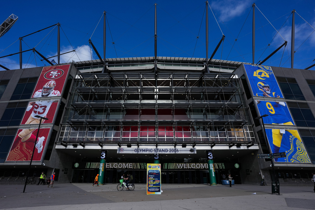 Outside the Melbourne Cricket Ground Wednesday, Sept. 9, 2026, in Melbourne, Australia, ahead of the NFL football game between the Los Angeles Rams and San Francisco 49ers. (AP Photo/Asanka Brendon Ratnayake)