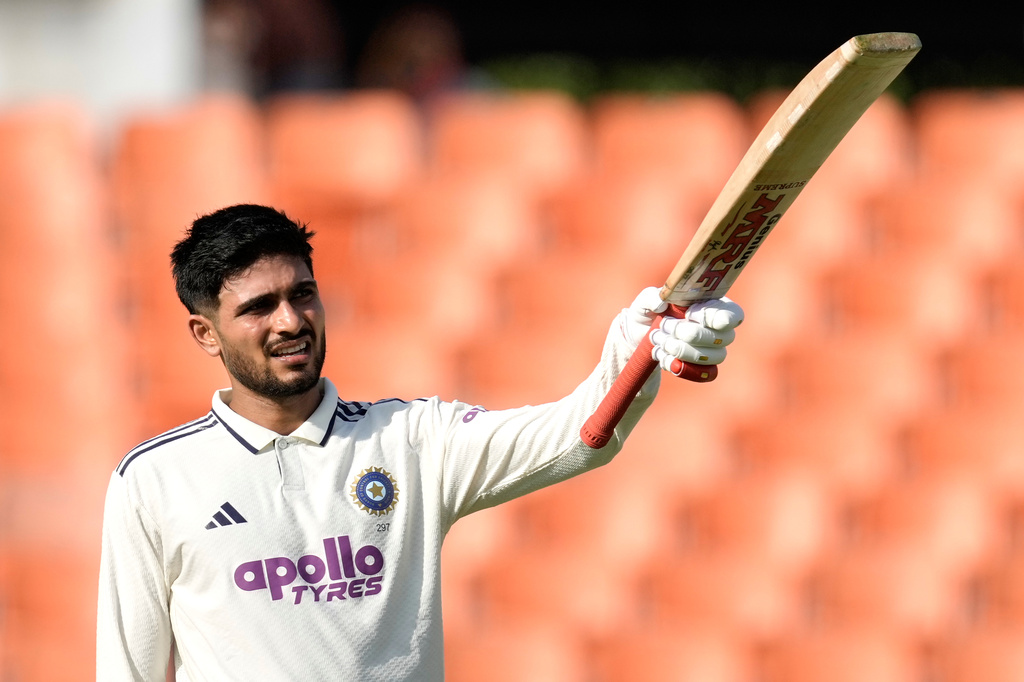 India's captain Shubman Gill celebrates his century on day one of the cricket test match between Afghanistan and India in New Chandigarh, India, Saturday, June 6, 2026. (AP Photo/Ashwini Bhatia)