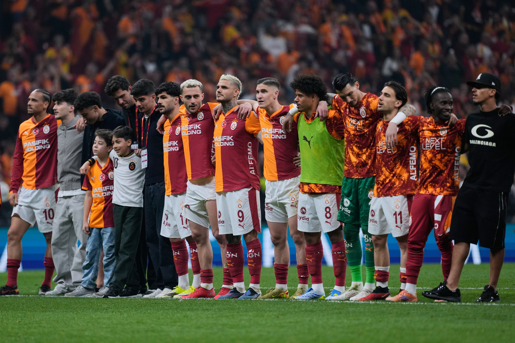 FILE -Galatasaray's players celebrate at the end of a Turkish Super Lig soccer match between Galatasaray and Fenerbahce in Istanbul, Turkey, April 26, 2026. (AP Photo/Khalil Hamra, File)