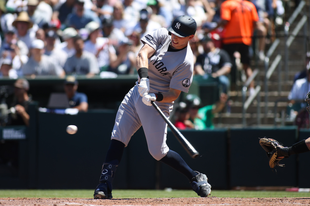 New York Yankees' Ben Rice hits an two-RBI triple during the third inning of a baseball game against the Athletics, Sunday, May 31, 2026, in West Sacramento, Calif. (AP Photo/Scott Marshall)