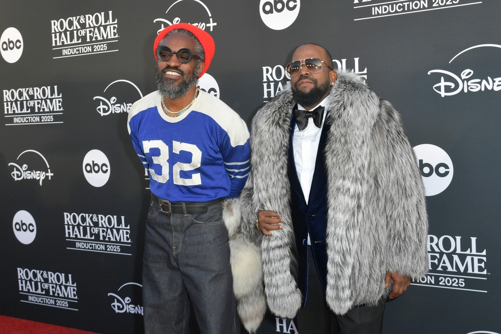 Andre 3000, left and Big Boi, of Outkast arrive at the 2025 Rock and Roll Hall of Fame Induction Ceremony on Saturday, Nov. 8, 2025, at L.A. Live in Los Angeles. (Photo by Richard Shotwell/Invision/AP)