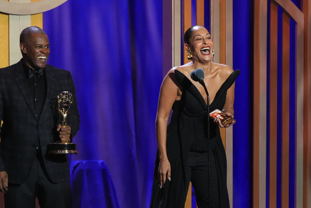 Tracee Ellis Ross, right, and the team from "Solo Traveling with Tracee Ellis Ross" accept the award for outstanding travel and adventure program during the 53rd Annual Daytime Emmy Awards on Friday, Oct. 30, 2026, at the Hollywood Palladium in Los Angeles. Tamara Tunie looks on from far left. (AP Photo/Chris Pizzello)