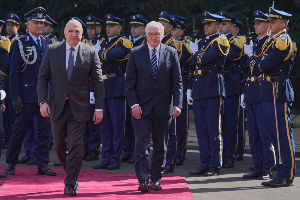Lebanese President Joseph Aoun, left, review the honor guard with his German counterpart Frank-Walter Steinmeier, at the presidential palace in Baabda, east of Beirut, Lebanon, Monday, Feb. 16, 2026. (AP Photo/Hussein Malla)