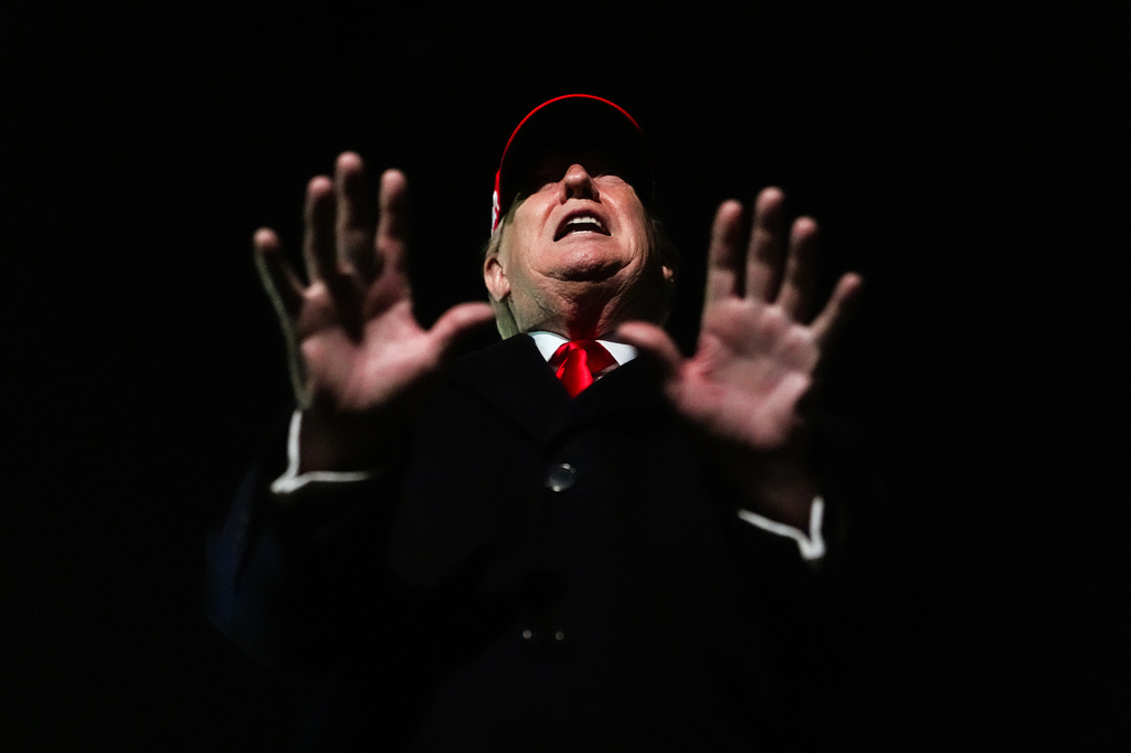 President Donald Trump speaks with reporters after disembarking Air Force One, Sunday, April 12, 2026, at Joint Base Andrews, Md. (AP Photo/Julia Demaree Nikhinson)