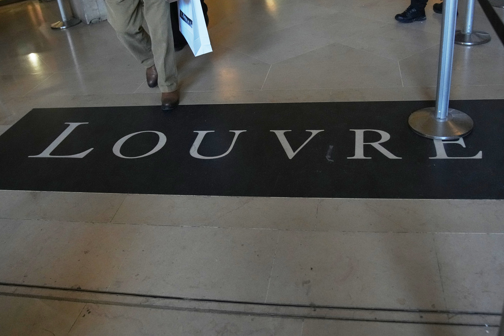 FILE - A carpet at Le Louvre museum, Wednesday, Nov. 19, 2025 in Paris. (AP Photo/Christophe Ena, File)
