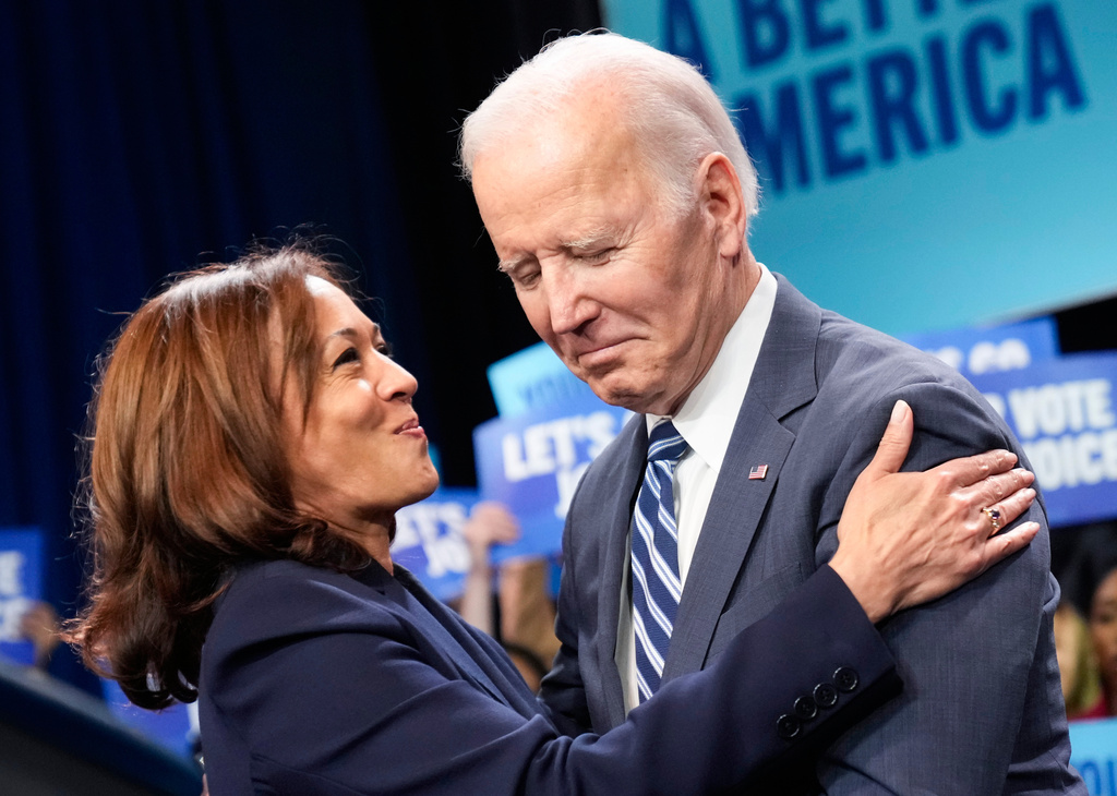 FILE - Vice President Kamala Harris hugs President Joe Biden as he walks to speak at Howard Theatre in Washington, Nov. 10, 2022. (AP Photo/Andrew Harnik, File)