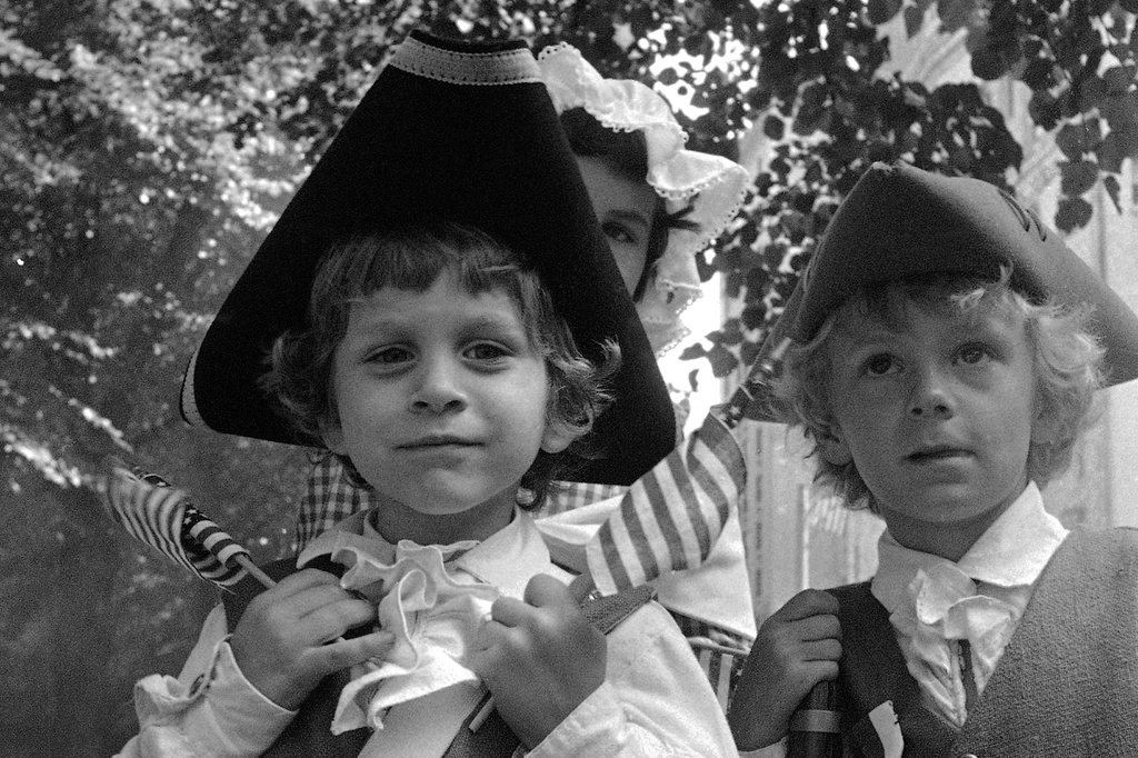 FILE - Five-year-old Thomas Scott of Bridgewater, Mass., celebrates the U.S. bicentennial in Boston's Fourth of July parade, Sunday, July 4, 1976. (AP Photo/File)