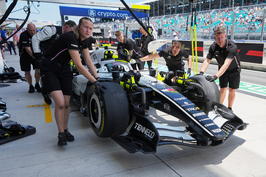 Cadillac driver Valtteri Bottas of Finland gets pushed back into his garage during the first practice session ahead of the Miami Formula One Grand Prix, Friday, May 1, 2026, in Miami Gardens, Fla. (AP Photo/Lynne Sladky)