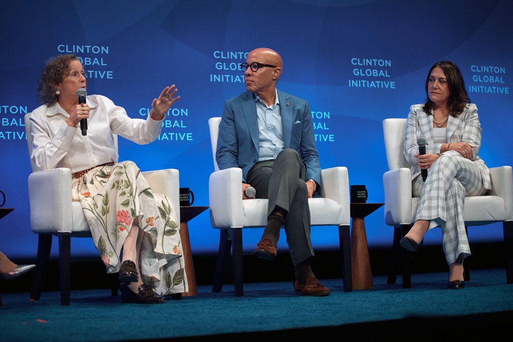 American film producer and philanthropist, Abigail Disney, left, speaks next to Darren Walker, President, Ford Foundation, center, and Maribel Perez Wadsworth, during the Clinton Global Initiative, on Wednesday, Sept. 24, 2025, in New York. (AP Photo/Andres Kudacki)