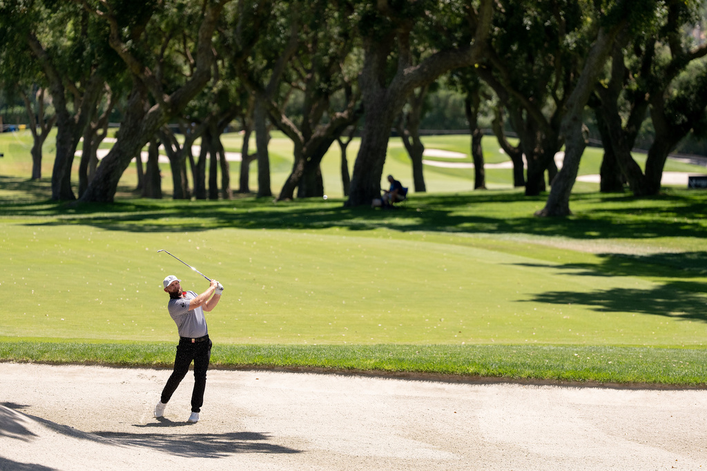 Tyrrell Hatton, of Legion XIII, hits from a bunker on the eighth hole during the second round of LIV Golf Andalucía at Real Club Valderrama, Friday, June 5, 2026, in San Roque, Spain. (Pedro Salado/LIV Golf via AP)