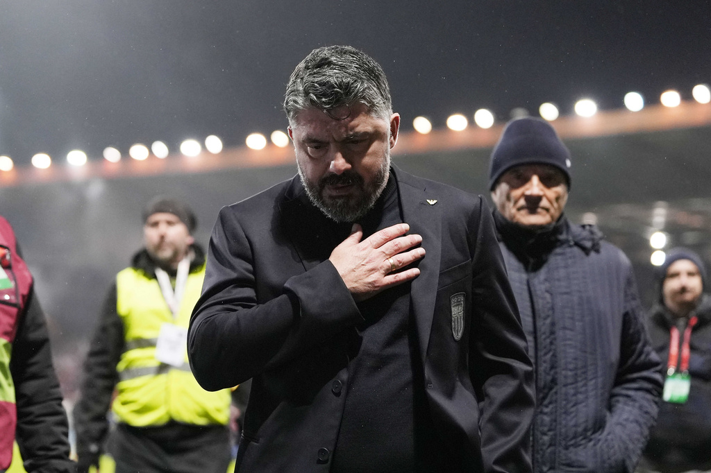 Italy's coach Gennaro Gattuso walks off the pitch after losing in a World Cup qualifying playoff final soccer match between Bosnia and Italy in Zenica, Bosnia, Tuesday, March 31, 2026. (Fabio Ferrari/LaPresse via AP)