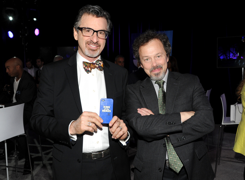 FILE - Robert Carradine, left, and Curtis Armstrong, co-hosts of the game show "King of the Nerds" appear at the TNT and TBS 2013 Upfront in New York on May 15, 2013. (Photo by Evan Agostini/Invision/AP, File)