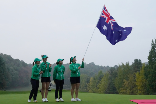 Winners of Australia team Stephanie Kyriacou, Grace Kim, Minjee Lee and Hannah Green wave their national flag after winning the LPGA International Crown golf tournament at the New Korea Country Club in Goyang, South Korea, Sunday, Oct. 26, 2025. (AP Photo/Ahn Young-joon) Winners of Australia team Stephanie Kyriacou, Grace Kim, Minjee Lee and Hannah Green wave their national flag after winning the LPGA International Crown golf tournament at the New Korea Country Club in Goyang, South Korea, Sunday, Oct. 26, 2025. (AP Photo/Ahn Young-joon)
