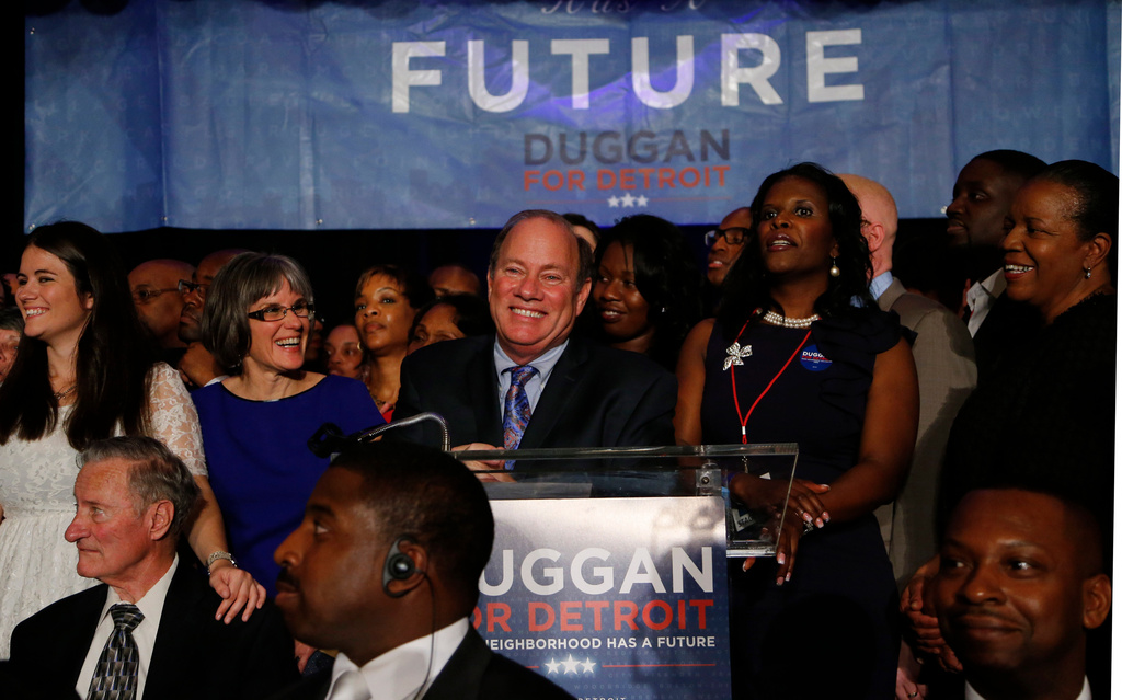 FILE - Mayoral candidate Mike Duggan speaks at his election night celebration in Detroit, Nov. 5, 2013. (AP Photo/Paul Sancya, File)