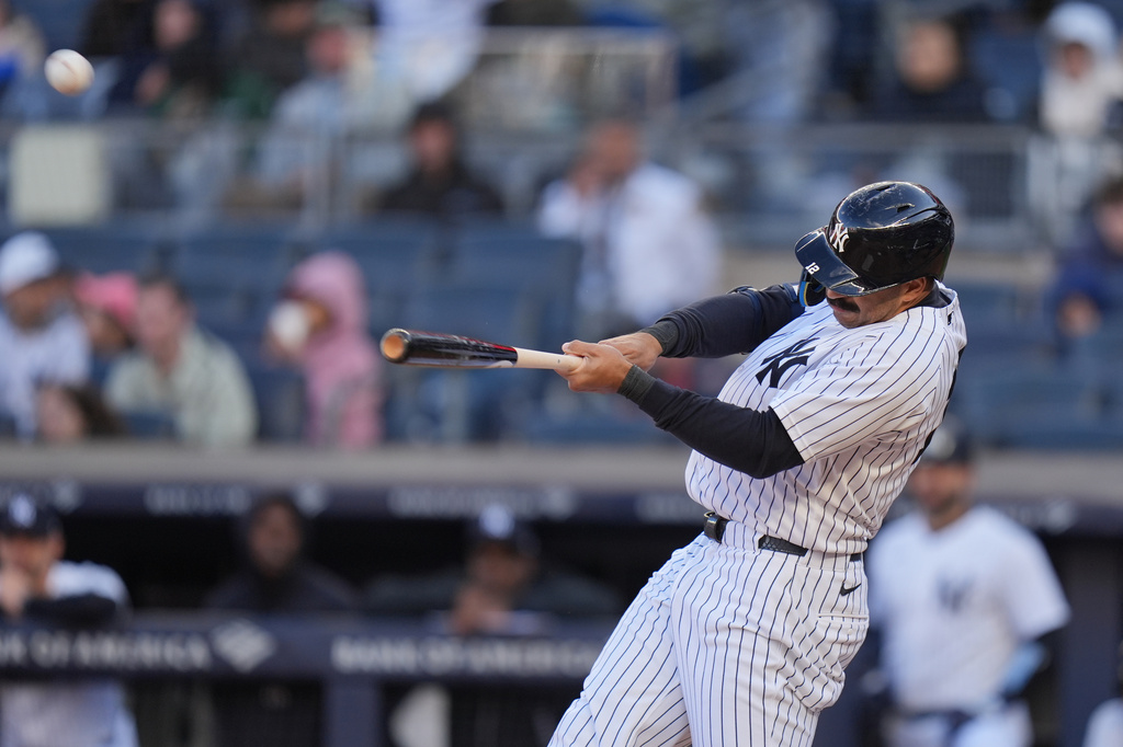New York Yankees' Trent Grisham hits a three-run homer during the fifth inning of a baseball game against the Kansas City Royals, Sunday, April 19, 2026, in New York. (AP Photo/Seth Wenig)