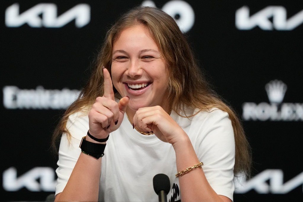 Amanda Anisimova of the United States reacts during a press conference ahead of the Australian Open tennis championship in Melbourne, Australia, Friday, Jan. 16, 2026. (AP Photo/Aaron Favila)