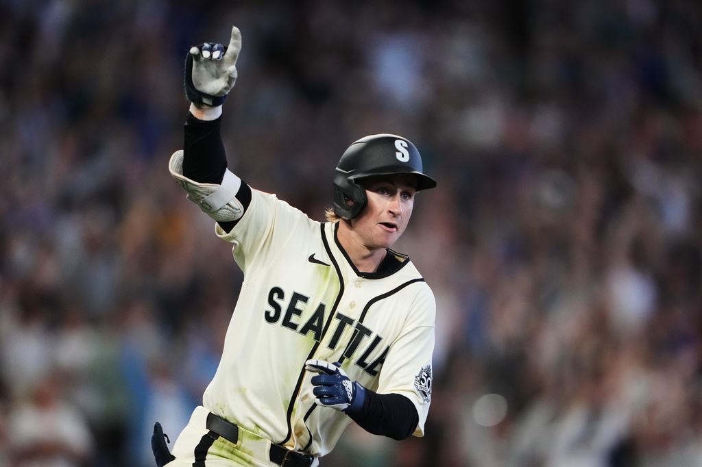 Seattle Mariners' Colt Emerson reacts after hitting a walk-off RBI single during the ninth inning to win a baseball game against the Minnesota Twins, Sunday, Aug. 2, 2026, in Seattle. (AP Photo/Lindsey Wasson)