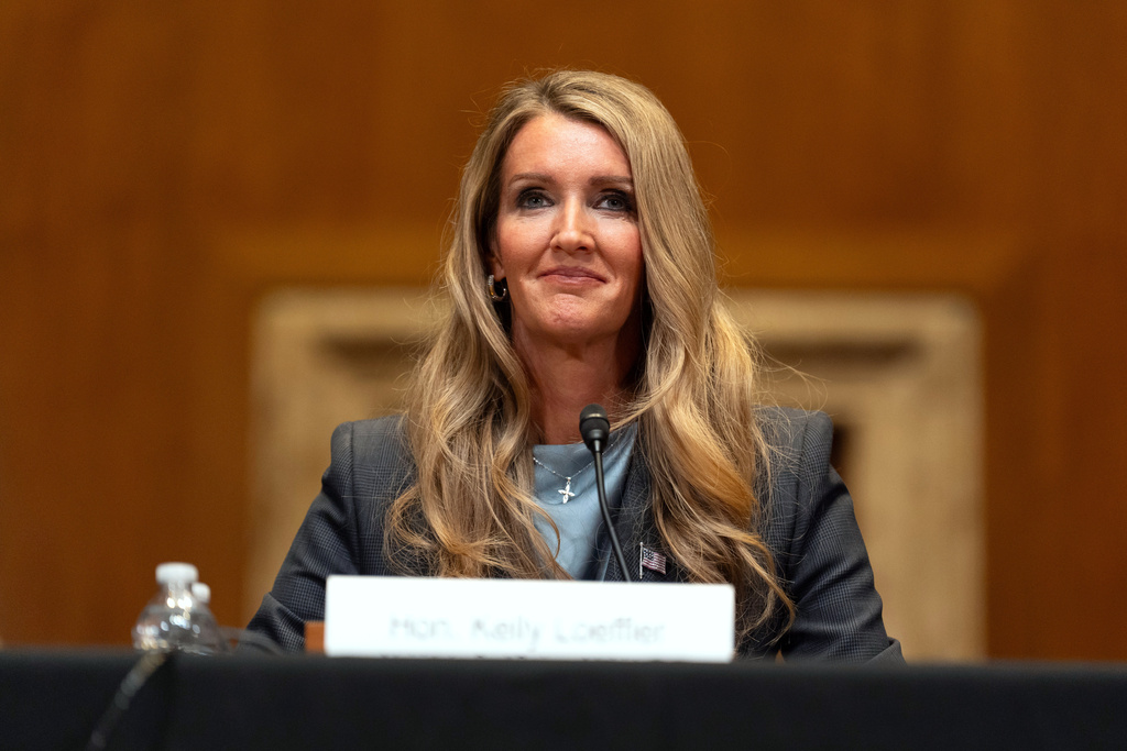 FILE - Small Business Administration administrator Kelly Loeffler listens during a hearing of the Senate Committee on Capitol Hill, May 21, 2025, in Washington. (AP Photo/Mark Schiefelbein, File)