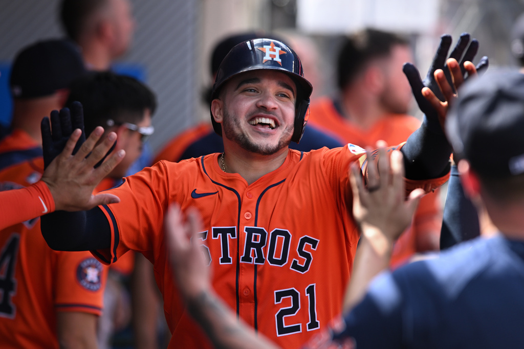 Houston Astros' Yainer Diaz (21) celebrates after his solo home run against the Los Angeles Angels during the fifth inning of a baseball game Sunday, Sept. 28, 2025, in Anaheim, Calif. (AP Photo/Wally Skalij)
