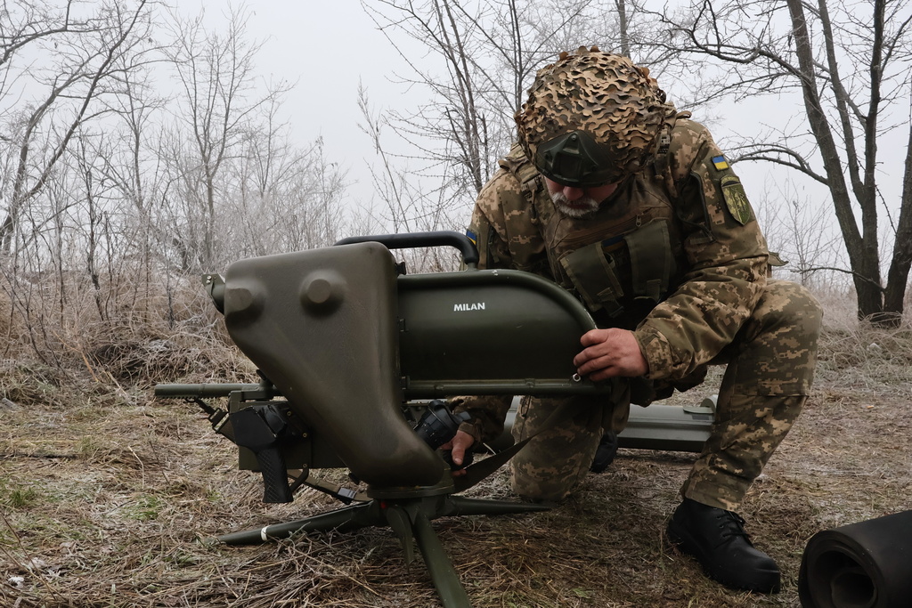 In this photo provided by Ukraine's 65th Mechanized Brigade press service, a soldier prepares a MILAN, a Franco-German anti-tank missile system, during a drill close to the frontline on the site of heavy battles with the Russian troops in the Zaporizhzhia region, Ukraine, Sunday, Jan. 4, 2026. (Andriy Andriyenko/Ukraine's 65th Mechanized Brigade via AP)
