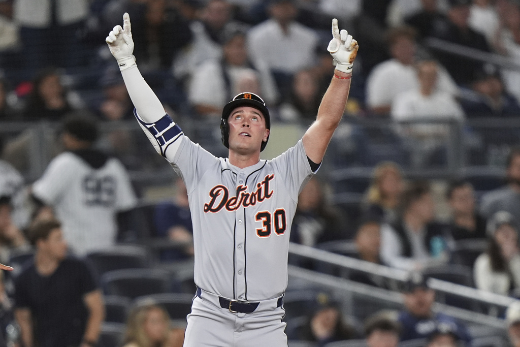 Detroit Tigers' Kerry Carpenter gestures after hitting a two-run triple during the seventh inning of a baseball game against the New York Yankees Tuesday, Sept. 9, 2025, in New York. (AP Photo/Frank Franklin II)