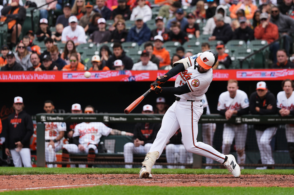 Baltimore Orioles' Colton Cowser hits a walkoff three-run home run during the ninth inning in the first baseball game of a doubleheader against the Detroit Tigers, Sunday, May 24, 2026, in Baltimore. (AP Photo/Stephanie Scarbrough)