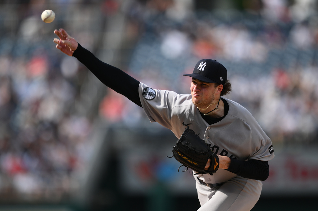 New York Yankees pitcher Cam Schlittler throws during the third inning of a baseball game against the Washington Nationals, Saturday, July 11, 2026, in Washington. (AP Photo/Nick Wass)