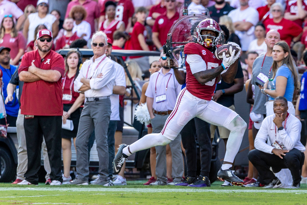 Alabama wide receiver Germie Bernard (5) grabs a pass and runs it into the end zone for a touchdown against Vanderbilt during the first half of an NCAA college football game, Saturday, Oct. 4, 2025, in Tuscaloosa, Ala. (AP Photo/Vasha Hunt)